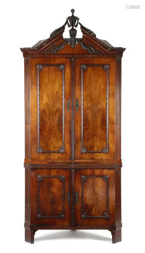 A DUTCH MAHOGANY STANDING CORNER CUPBOARD LATE 18TH CENTURY Neo-Classical decorated with egg and