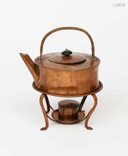 A Keswick School of Industrial Arts copper kettle on a stand, drum form with over-slung handle,