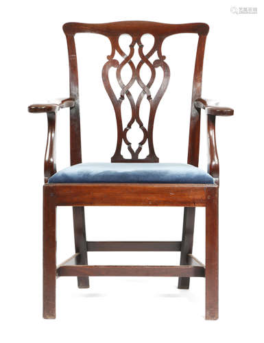 A GEORGE III MAHOGANY OPEN ARMCHAIR c.1770 with an interlaced and pierced splat back with