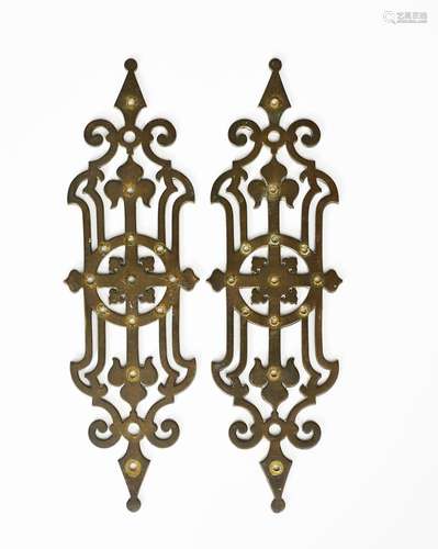 A pair of Gothic Revival brass door plates in the manner of AWN Pugin, pierced and cast with fleur