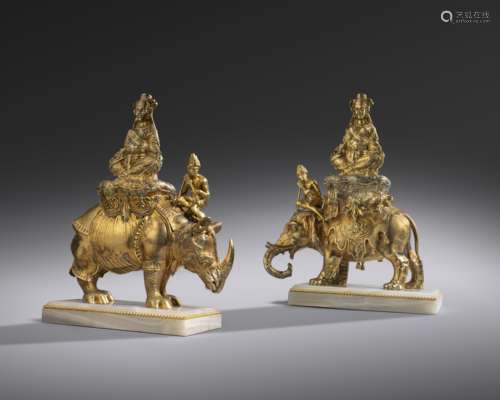 TWO FINE SILVER-GILT MODELS OF AN ELEPHANT AND RHINOCEROS WITH EXOTIC RIDERS PROBABLY CONTINENTAL,