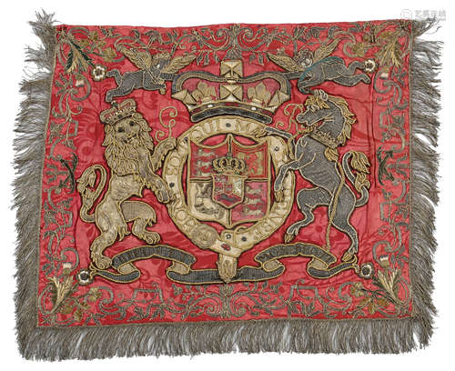 A RED SILK DAMASK PENNANT OR BANNER with an embroidered border and applique central Royal Coat of