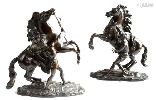 A PAIR OF BRONZE MARLY HORSE GROUPS LATE 19TH CENTURY after Guillaume Coustou (French 1677-1746), on