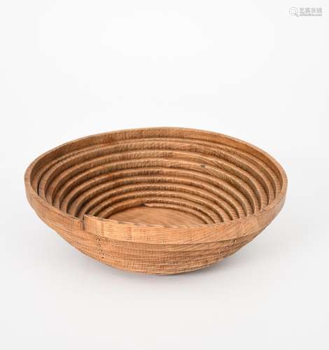 Jim Partridge (born 1953) a steam bent oak bowl, with brass tacks, stamped JB Partridge 37.5cm.