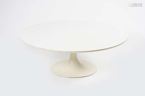 An Arkana Tulip table designed by Eero Saarinen, circular, white laminated wood top, on painted