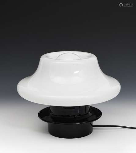 A Vistosi glass table lamp, the black glass base supporting opaque white glass mushroom shade,