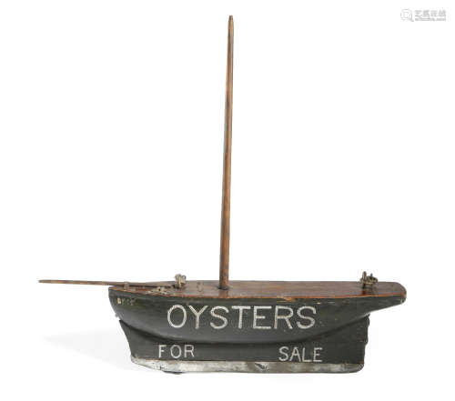 A NAIVE PAINTED CARVED WOOD BOAT HANGING SHOP SIGN LATE 19TH / EARLY 20TH CENTURY hung with