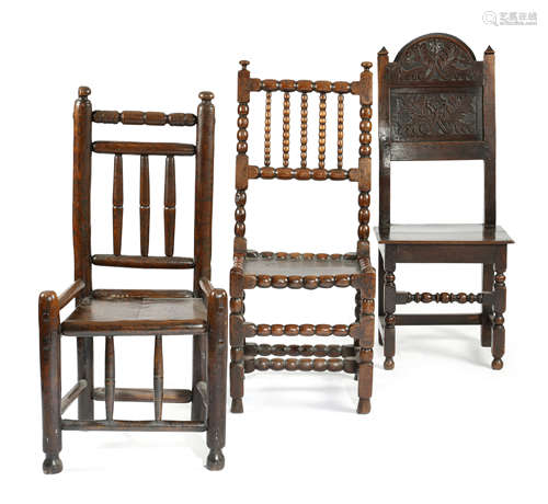 THREE COUNTRY CHAIRS LATE 17TH CENTURY AND LATER comprising: a bobbin turned chair with a solid