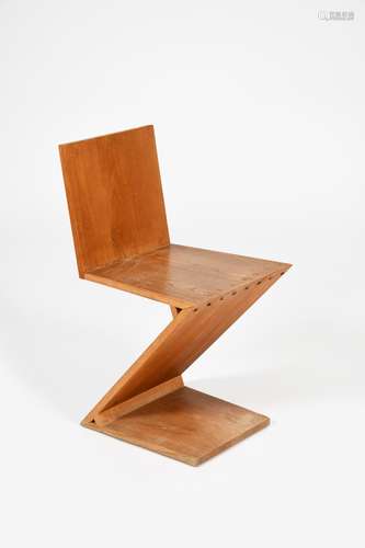 An oak Zig Zag chair designed by Gerrit Thomas Rietveld, manufactured by H.G.M Gerard van de