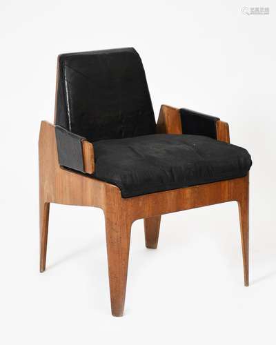 A bent-ply Canberra chair designed by John Wright probably manufactured by Craft, with leather