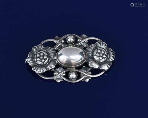 A Georg Jensen silver brooch designed by Georg Jensen, model no.89, pierced and cast with