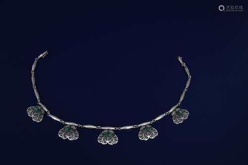 A Georg Jensen silver and malachite necklace, five panels cast with foliate motif each applied