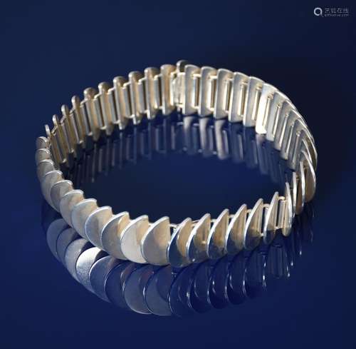 A Georg Jensen silver necklace combining two bracelets designed by Astrid Fog, model no. 169, formed