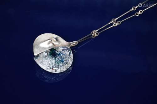 A Lapponia Studio silver and perspex necklace designed by Bjorn Weckstrom, split circular pendant,