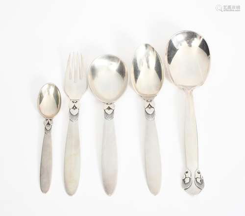 A Georg Jensen silver Cactus serving spoon designed by Gundolph Albertus, three other Cactus