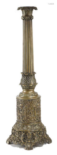 A FRENCH PRESSED BRASS TABLE LAMP LATE 19TH CENTURY with a bronzed finish and decorated in the