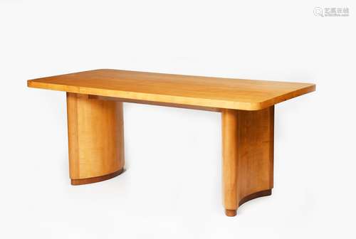 A satinwood veneer dining table, the rectangular top on two curved pedestals with walnut feet, 183 x