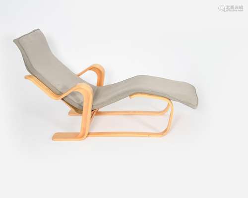 An Isokon Plus bent ply long chair designed by Marcel Breuer, with grey padded cushion, applied