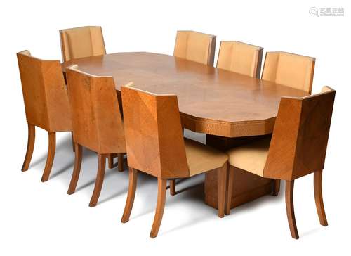 An Epstein satinwood table and eight chairs designed by Harry & Lou Epstein, panelled veneer, shaped