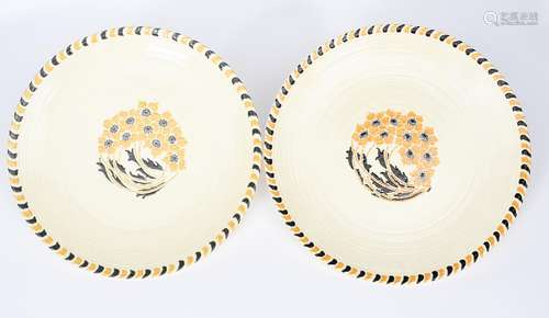 A pair of Crown Ducal Blossom chargers designed by Charlotte Rhead, pattern no.3258, tubeline