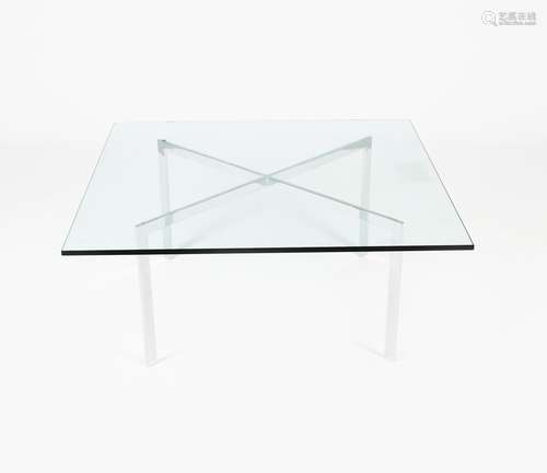 A modern Barcelona chrome framed table originally designed by Lilly Reich and Mies van der Rohe,