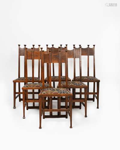 A set of six oak chairs the design attributed to George Montague Ellwood, slightly curved back