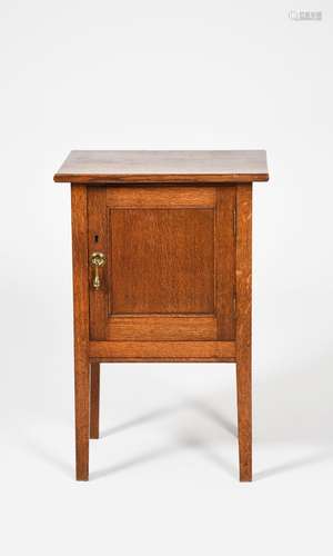 An oak pot cupboard the design attributed to Arthur Simpson of Kendal, square section, rectangular