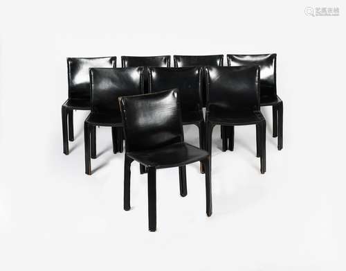 A set of eight Cassina Cab black leather chairs designed by Mario Bellini, and a Zanotta anodised