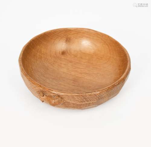 A Robert Mouseman Thompson oak bowl, adzed circular form with carved mouse signature to side,