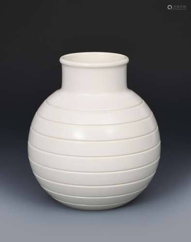 A Wedgwood Moonstone vase designed by Keith Murray, shape no.3801, ribbed ovoid form with collar