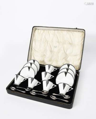 An unusual Shelley Eve shape coffee set for six in original case designed by Eric Slater, pattern