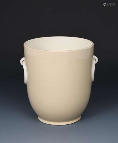 A rare Wedgwood vase designed by Keith Murray, flaring cylindrical form with cast loop handles,