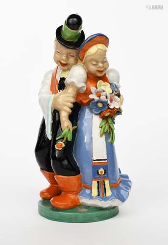 Young Lovers a pottery figure by Miklos Komlos, modelled as a young couple in national dress,