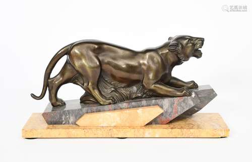 A patinated spelter model of a stalking tiger, on stepped rectangular base unsigned, 43.5cm. wide