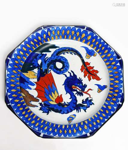 a rare Wardle pottery octagonal charger designed by Frederick Rhead, pattern no.323, painted to