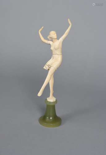 λ Ludwig Walter Exotic Dancer a carved ivory model of a bare breasted dancer, standing on one leg