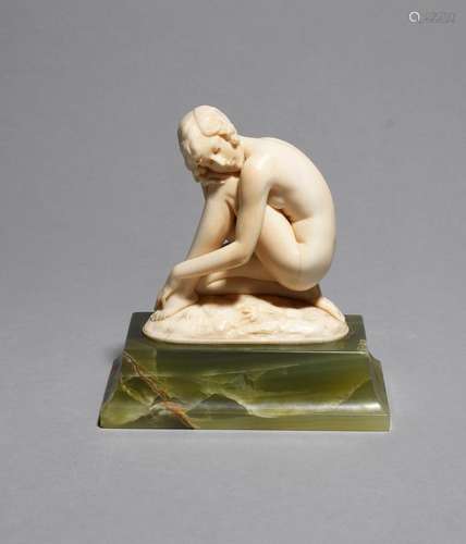 λ Ferdinand Preiss (1882-1943) Dreaming a carved ivory figure on flaring green onyx base, signed F