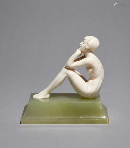 λ Ferdinand Preiss (1882-1943) Thoughts, an ivory figure, model no. 1131, on tapering green onyx