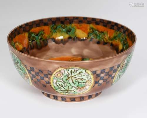 A rare Wedgwood bowl designed by Daisy Makeig-Jones, the exterior painted with roundels of vine leaf