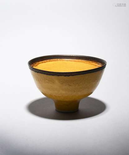 ‡ Dame Lucie Rie DBE (1902-1995) a porcelain footed bowl with bronze rim, covered to the foot with a