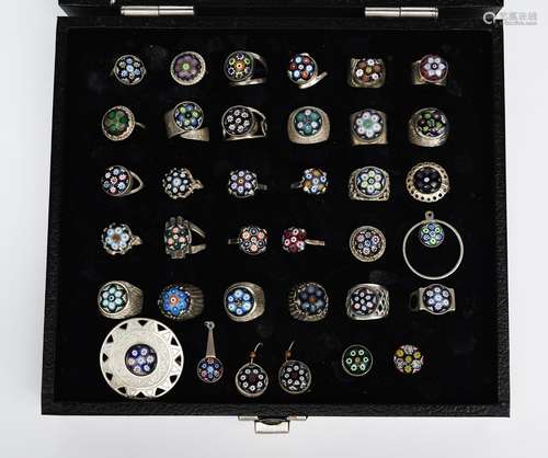 A collection of Strathearn glass mounted jewellery, comprising twenty-nine rings, five pairs of cuff