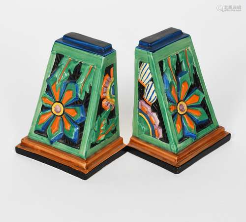 'Floreat' a pair of Clarice Cliff Fantasque Bizarre book ends, cast in relief and painted in colours