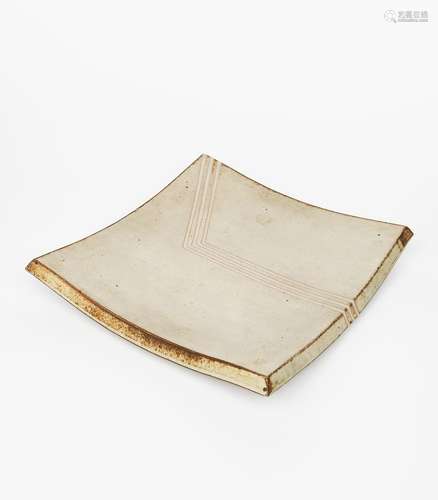 ‡ Ursula Scheid (born 1932) a stoneware platter, dated 1988, near square section with shallow