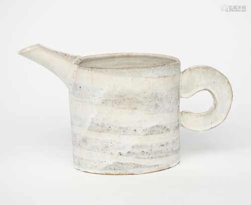 ‡ Emmanuel Cooper OBE (1938-2012) a stoneware jug with applied handle, covered in a banded white and