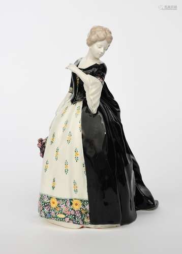 A Goldscheider Pottery model of Beidermeier lady, model no.4357, modelled wearing long flowing black