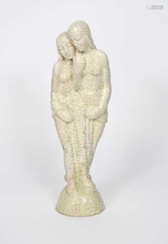 A Goldscheider Pottery figure of two huddling naked women, partially wrapped in a towel, covered