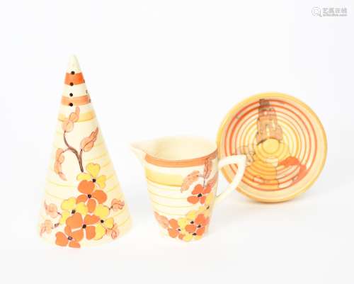 'Orange Hydrangea' a Clarice Cliff Bizarre Conical sugar sifter, painted in colours, an Orange