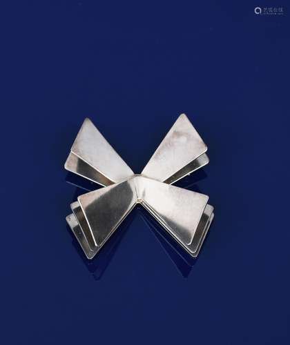 A Georg Jensen silver brooch designed by Nanna Ditzel, model no.335, three angled crosses, stamped