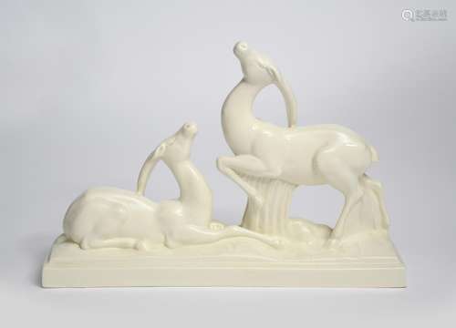 A Lemanceau Pottery model of two resting ibex, modelled one standing the other lying on