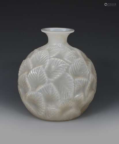 'Ormeaux' no.984 a Lalique cased glass vase designed by Rene Lalique, modelled in relief, white